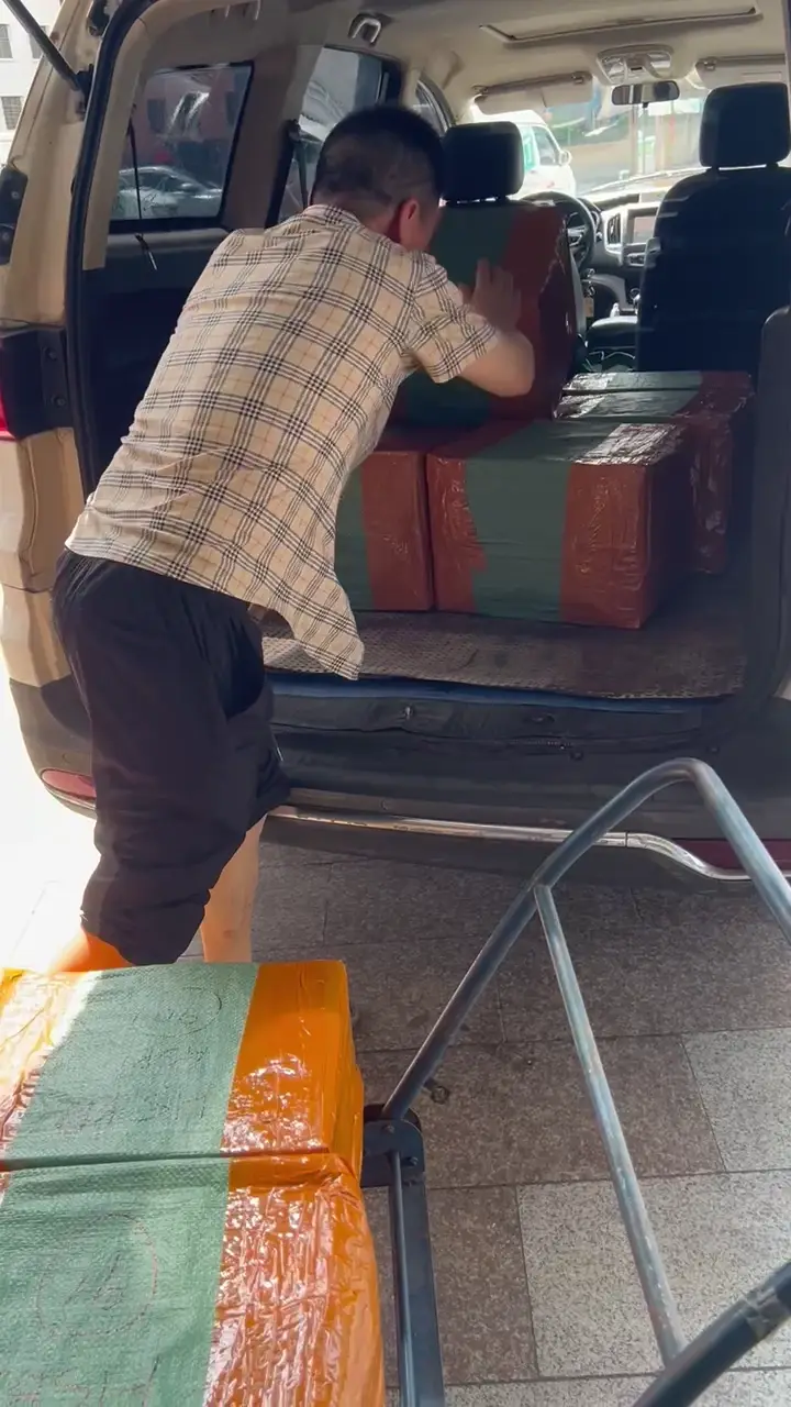 Bulk cartons loaded into vehicle video